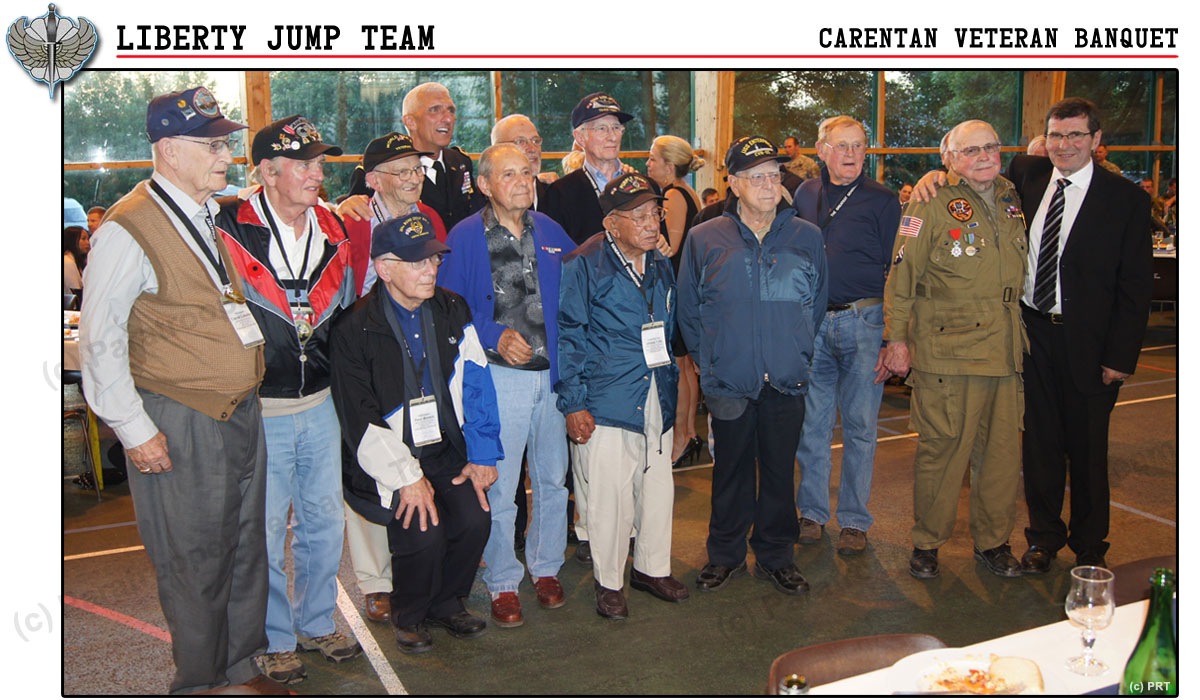 US General Hertling posing with 12 WWII veterans